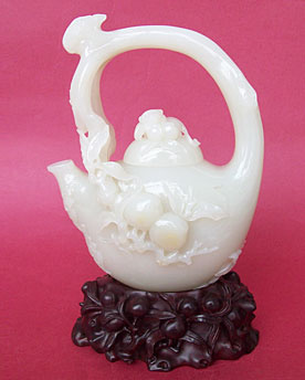 白玉籽《提梁桃壺》
